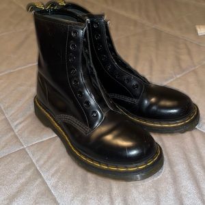 Black Dr. Marten boots size 7 women. Slight wear on the right heel